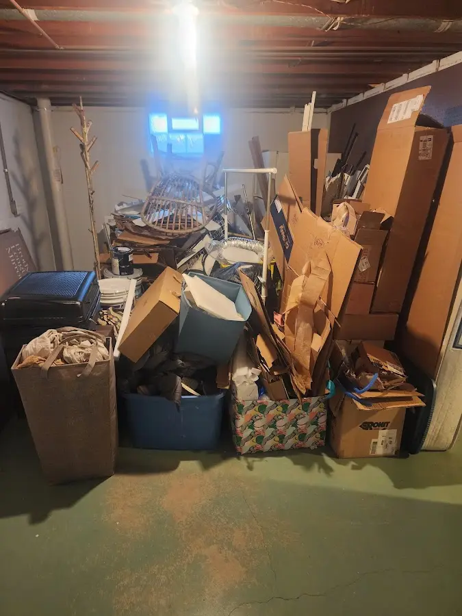 Roll-off dumpster container at job site for 2 Yard Dumpster Rental in Altoona